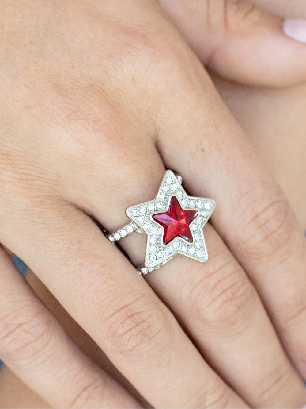 Silver Star Ring with Ruby-Red Center Stretchy fits appropriately sizes 6.5 - 9